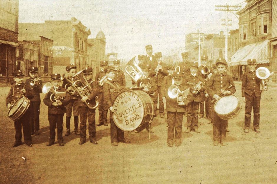Neumann's Juvenile Band on Main Street.    This photo's individuals look very similar to the band photo in the 1906 book.  A news item in the March 10, 1904 